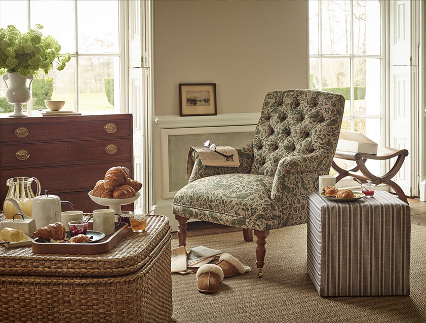 Snape Button Back chair in Spill Resistant V&A Bird & Rabbit Dark Green and Cube footstool in Spill Resistant RHS Etta's Stripe Ink